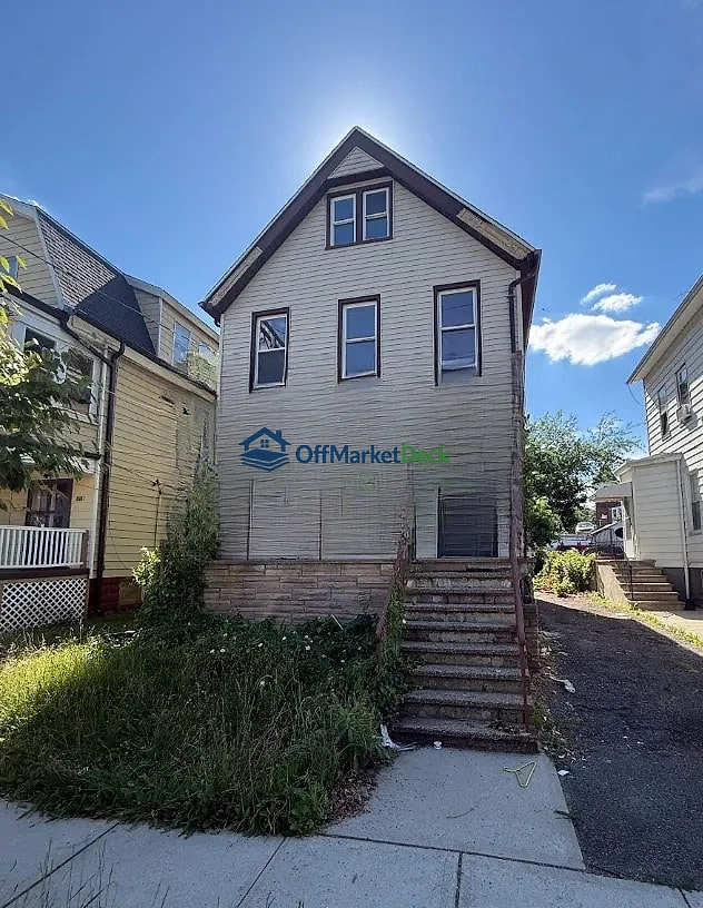 Off-market duplex in West Orange, New Jersey — 5 beds, 2 baths, $475,000 - Blurred background Image
