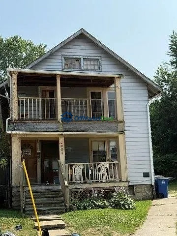 Off-market multi family in Cleveland, Ohio — 4 beds, 2 baths, $109,000 - Blurred background Image