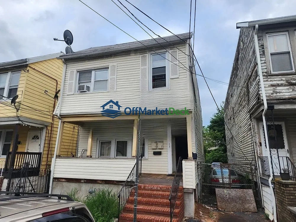 Off-market house in Newark, New Jersey — 7 beds, 3 baths, $320,000