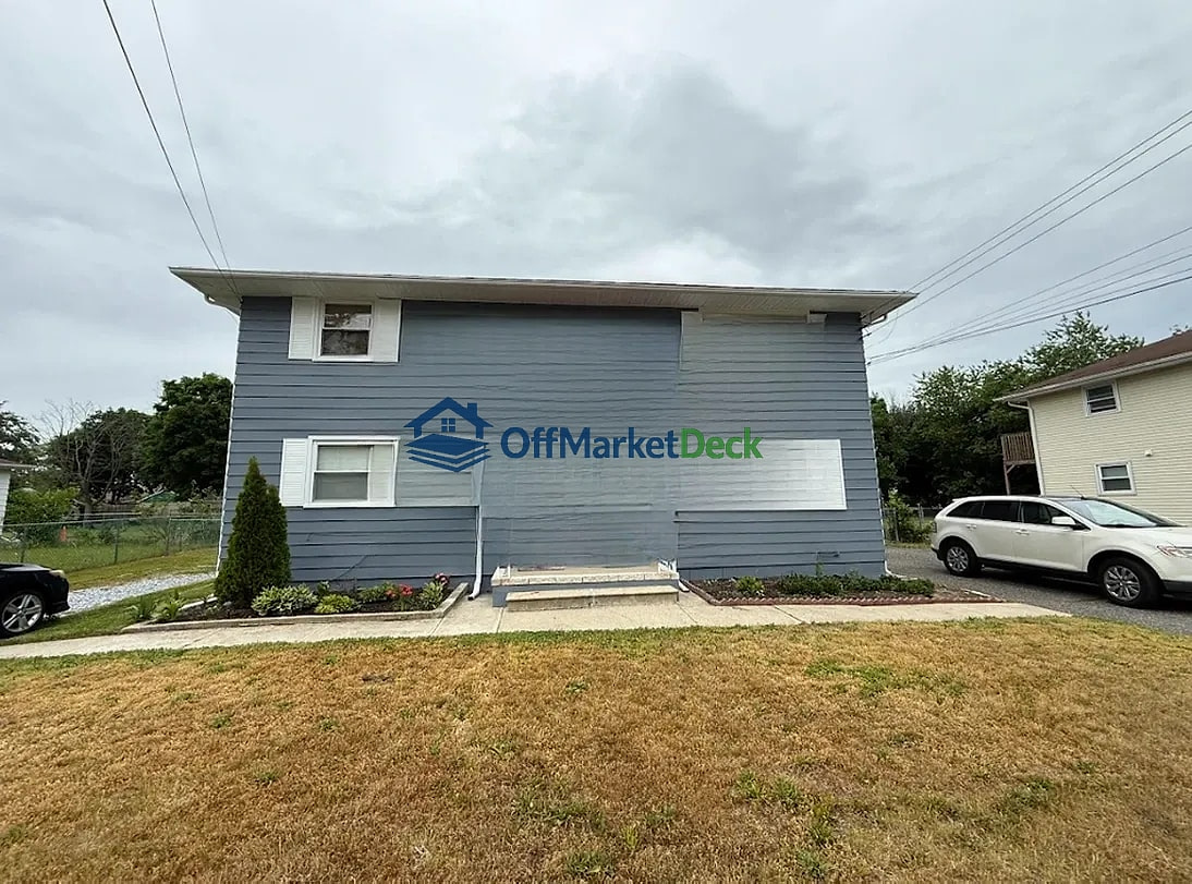 Off-market multi family in Vineland, New Jersey — 4 beds, 2 baths, $310,000 - Blurred background Image