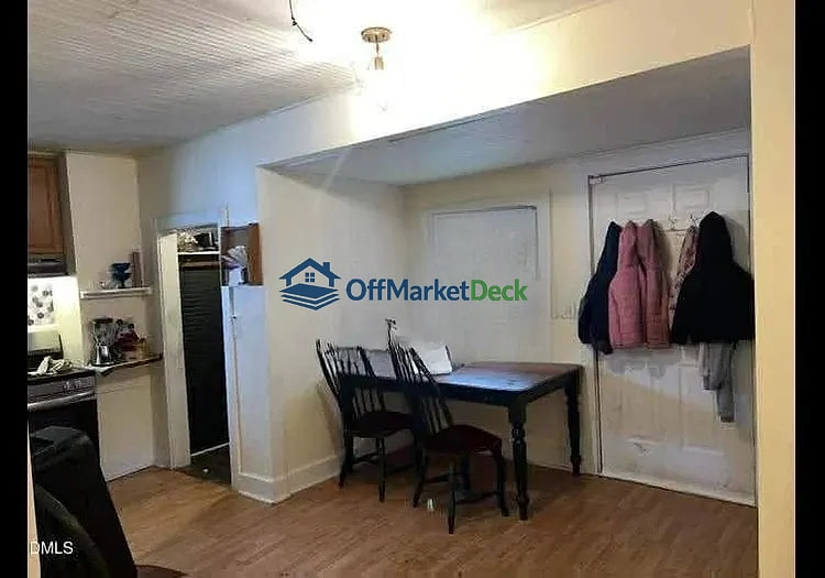 Off-market house in Durham, North Carolina — 4 beds, 2 baths, $207,000 — photo 4 of 5
