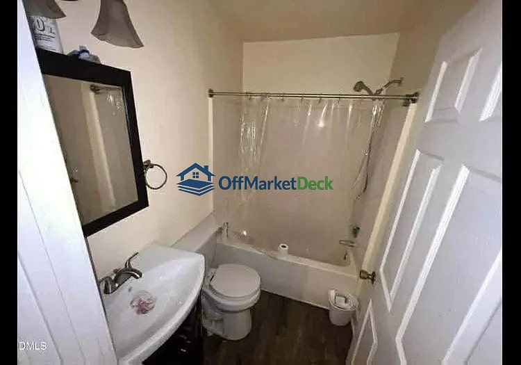 Off-market house in Durham, North Carolina — 4 beds, 2 baths, $207,000 — photo 2 of 5